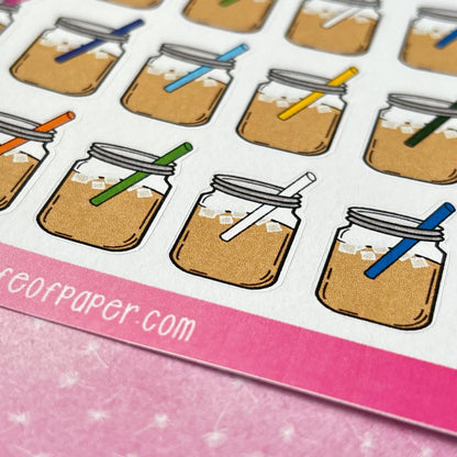 Mason Jar Stickers showcasing iced coffee-filled mason jars with ice cubes and colorful straws are displayed against a pink background.