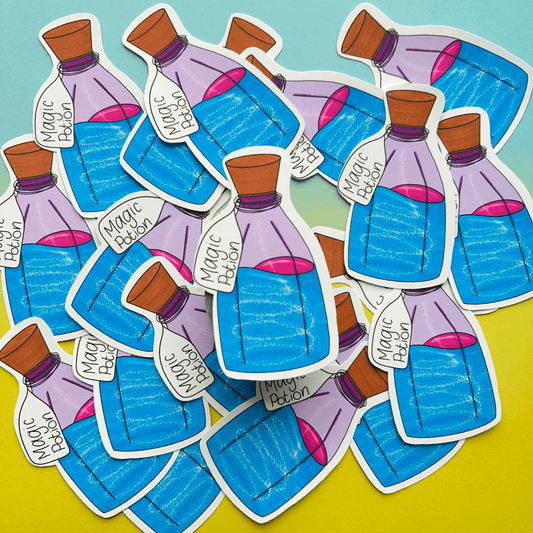 Magic Potion Stickers, featuring bottles labeled "Magic Potion" with purple liquid inside, are scattered on a blue and yellow surface, showcasing their strong matte vinyl finish.