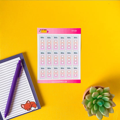 A flat lay image of a bright yellow desk. On it lies a bill tracker sheet adorned with Bill Tickbox Planner Stickers, a small lined notebook with a drawing of a fox in the corner, a purple pen, and a potted succulent plant.
