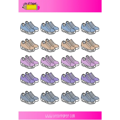 A grid of colorful Exercise Planner Stickers with "EXERCISE" written on the sides serves as stylish exercise reminders. The stickers come in blue, brown, purple, and gray. Images are neatly arranged in a pattern on a white background with pink borders. The site name "Life of Paper" is featured at the top and bottom.