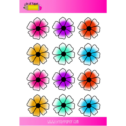 A grid of twelve colorful Flower Planner Stickers with five large petals each, arranged in a 3x4 format. The flowers are in shades of purple, pink, orange, yellow, green, and blue. Perfect for your planner or bullet journal! The top reads "Life of Paper," and the bottom reads "www.lifeofpaper.com.