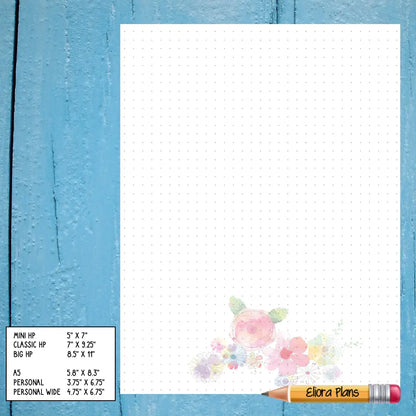 A blue wooden background features a dotted journal page with a pastel floral design in the bottom right corner. A yellow pencil labeled "Elora Plans" rests at the bottom right. A small chart on the left lists various Floral Themed Notepaper sizes in inches, perfect for customizing your notepaper preferences.