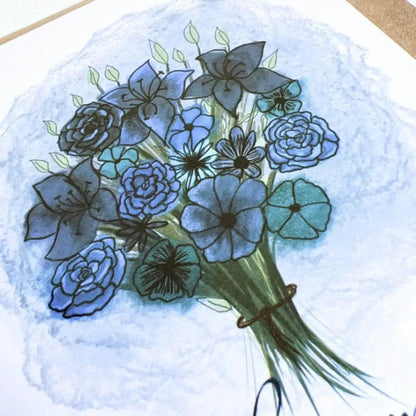 An illustration on the "With Sympathy Greeting Card" features a floral bouquet composed of various blue and teal flowers, including roses and other shapes, elegantly tied together with a brown string. The background showcases a soft, textured blue and white wash, imparting a gentle, artistic ambiance to the image.